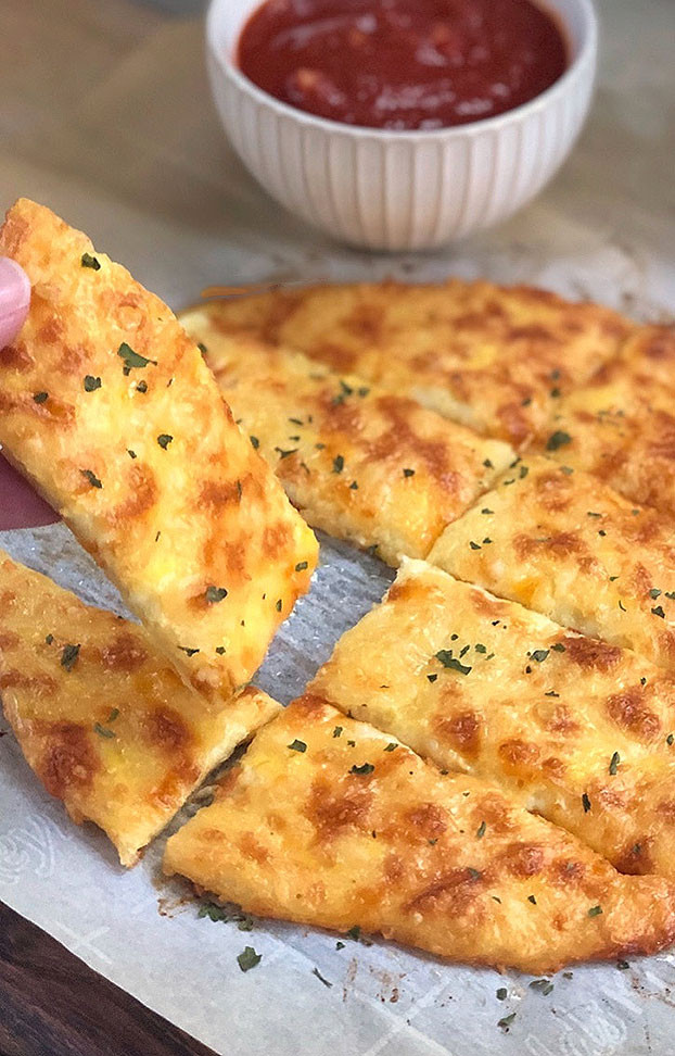 Cheesy Keto Bread Sticks
 KETO Cheesy Garlic Bread Sticks Recipe – Delishopedia