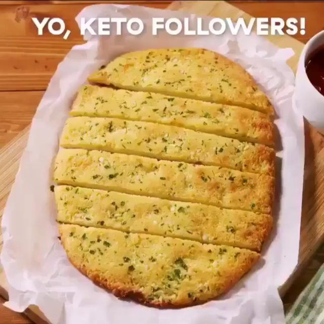 Delish Keto Garlic Bread
 KETO GARLIC BREAD by delish 💁 ⁠ ⁠ Make sure to Tag a