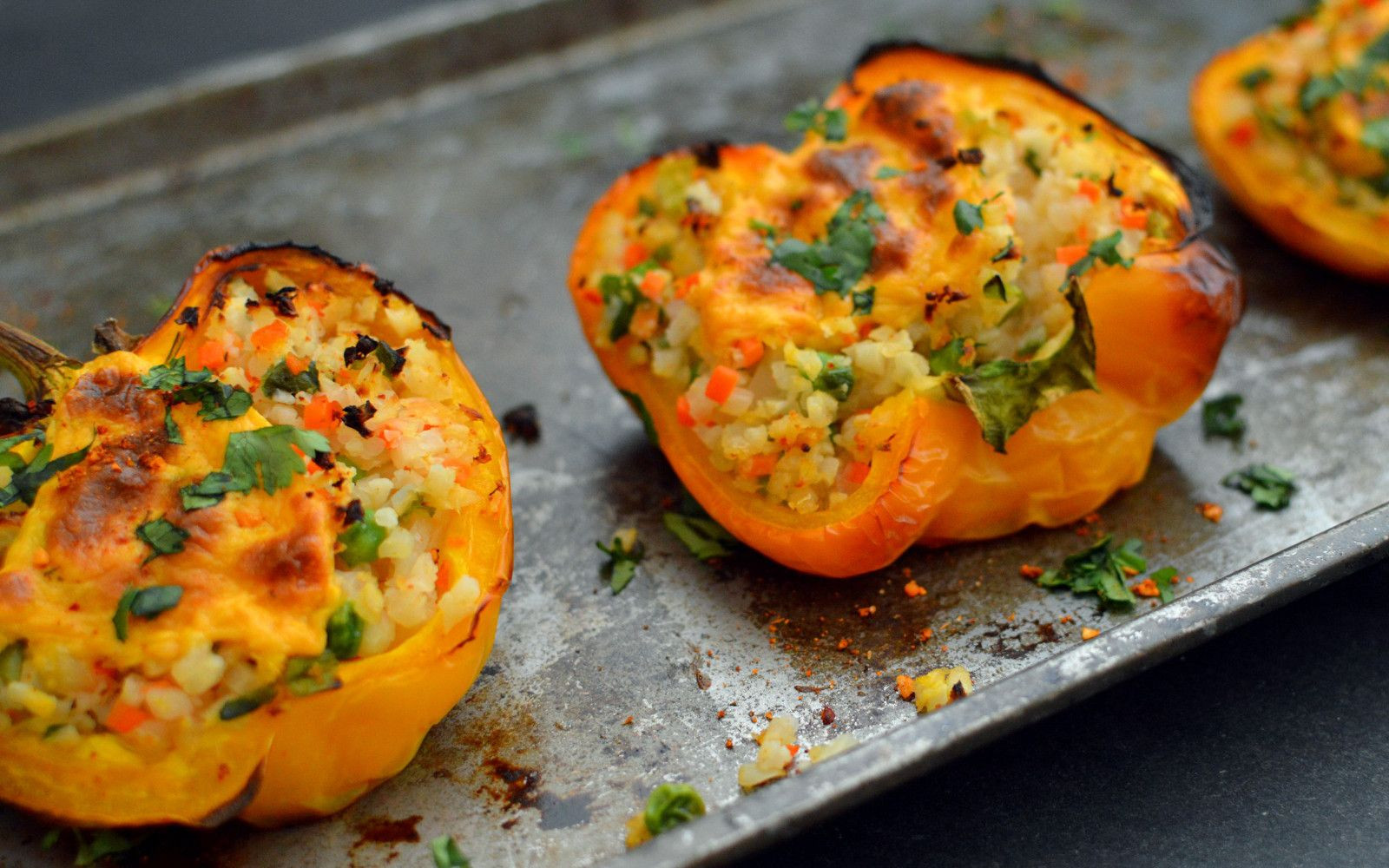 Vegetarian Keto Stuffed Peppers
 Cheesy Cauliflower Rice Stuffed Peppers [Vegan Gluten